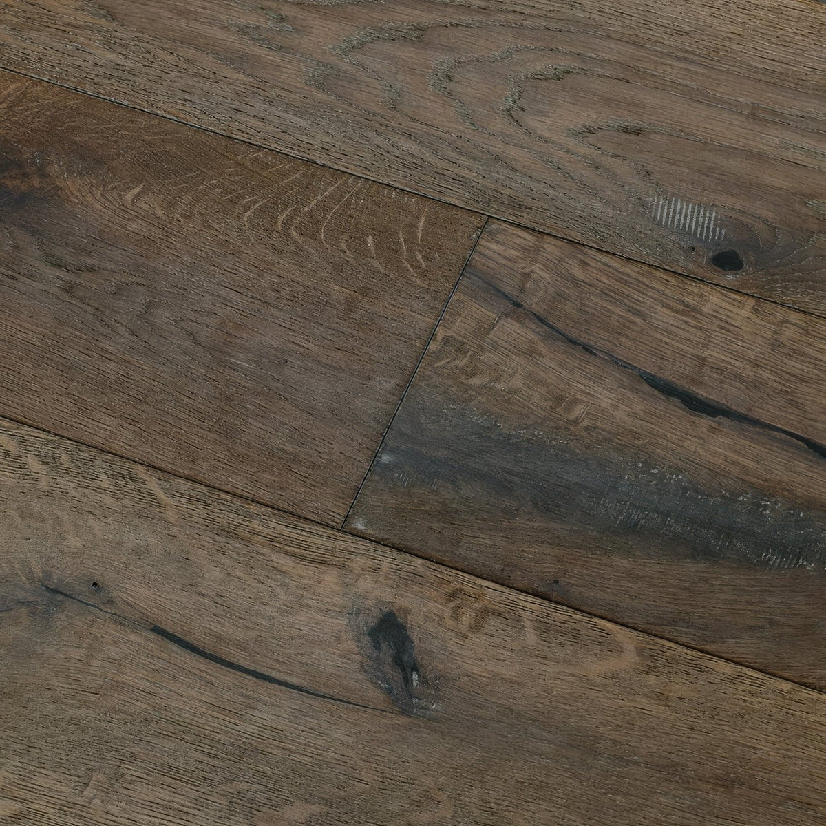 Dark brown reclaimed wood flooring with visible grain knots and natural imperfections in dartmouth truffle oak