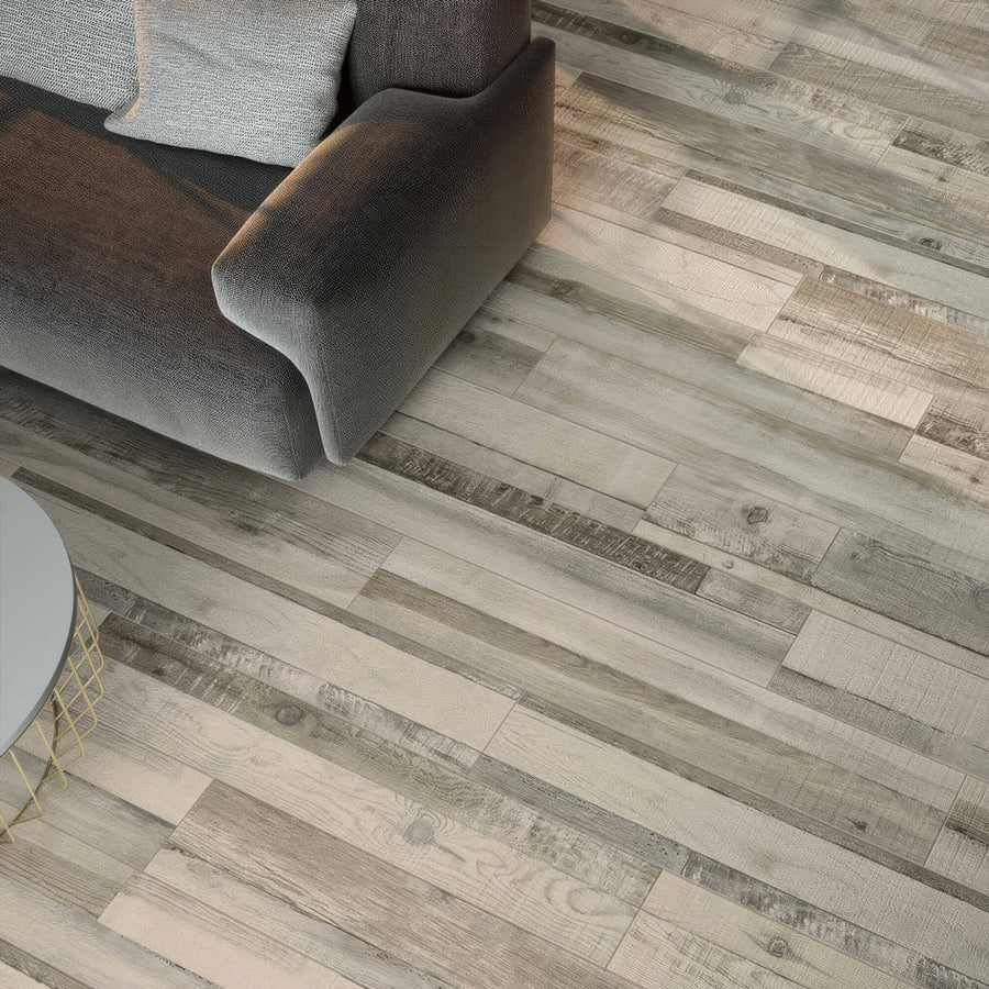 Darwin grey glazed porcelain wood effect flooring with gray rustic weathered wood-plank laminate texture and grain patterns