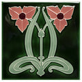 A dauphine square green ceramic tile with two pink flowers and an art nouveau central design on victorian green