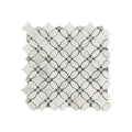 Close detail of the tumbled marble flower motif showing softened petal edges in white and platinum grey