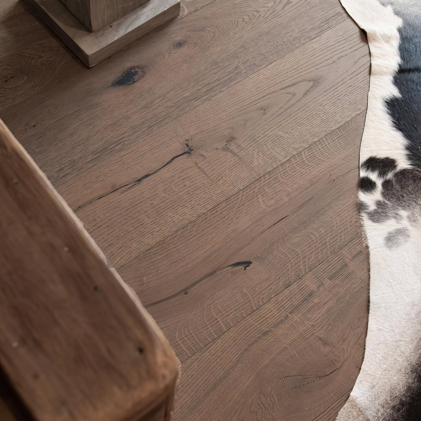 Dc101 deco frozen umber warm-toned hardwood floor with natural wood grain and subtle imperfections in umber color
