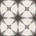 De-segni moun 20 x 20cm geometric patterned tile with white gray pentagonal shapes and central dark brown diamond design