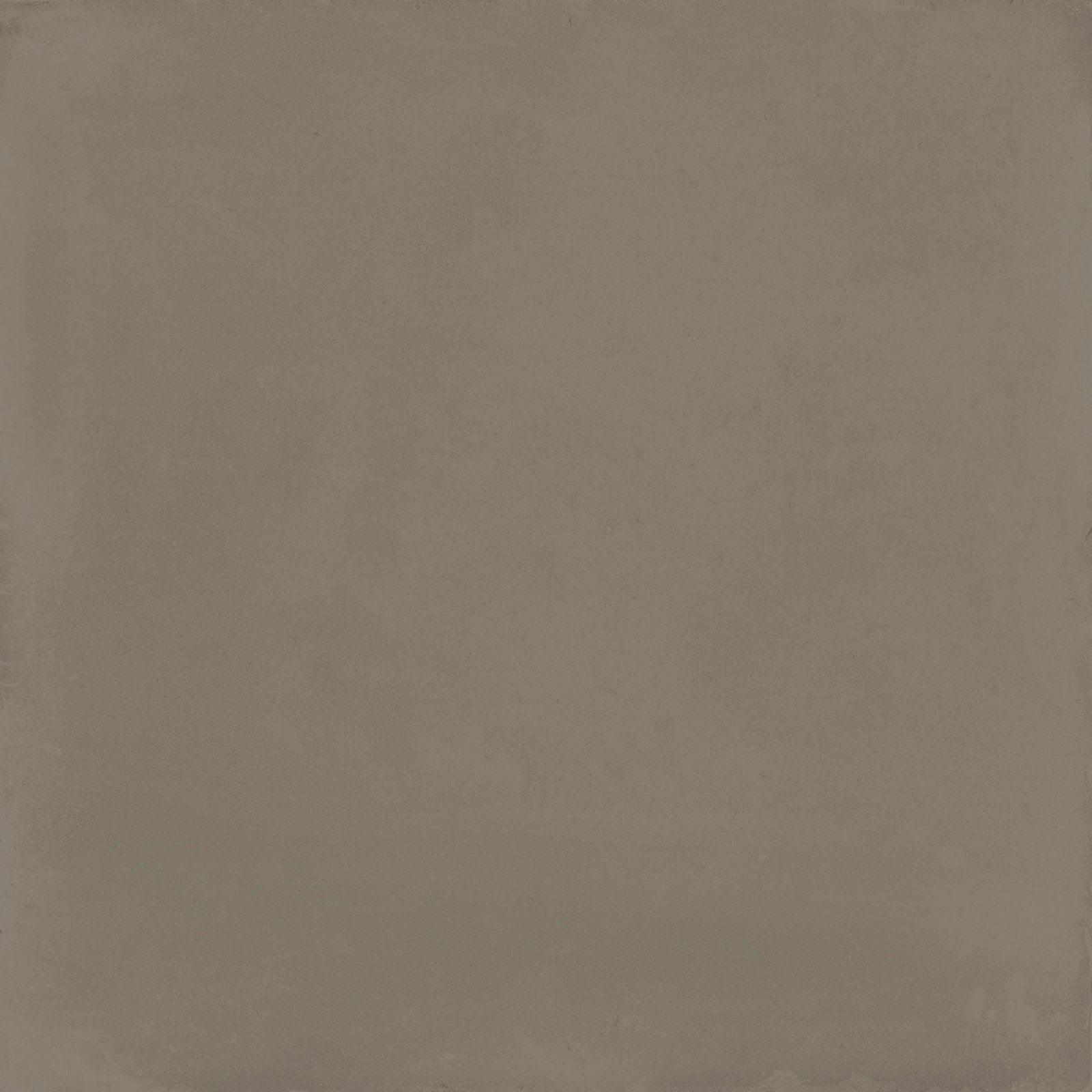 A matte gray textured ceramic square tile 20 x 20 cm from the de-segni mud collection