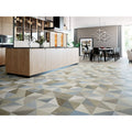 Geometric patterned floor tiles in muted gray beige and soft blue tones from decor munich 1820 collection