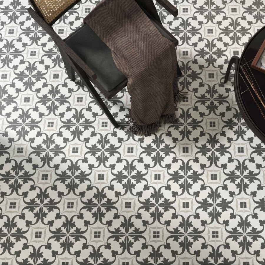 Gray and white patterned 15 x 15cm Decorata 03 tile featuring ornate repeating floral design for decorative flooring