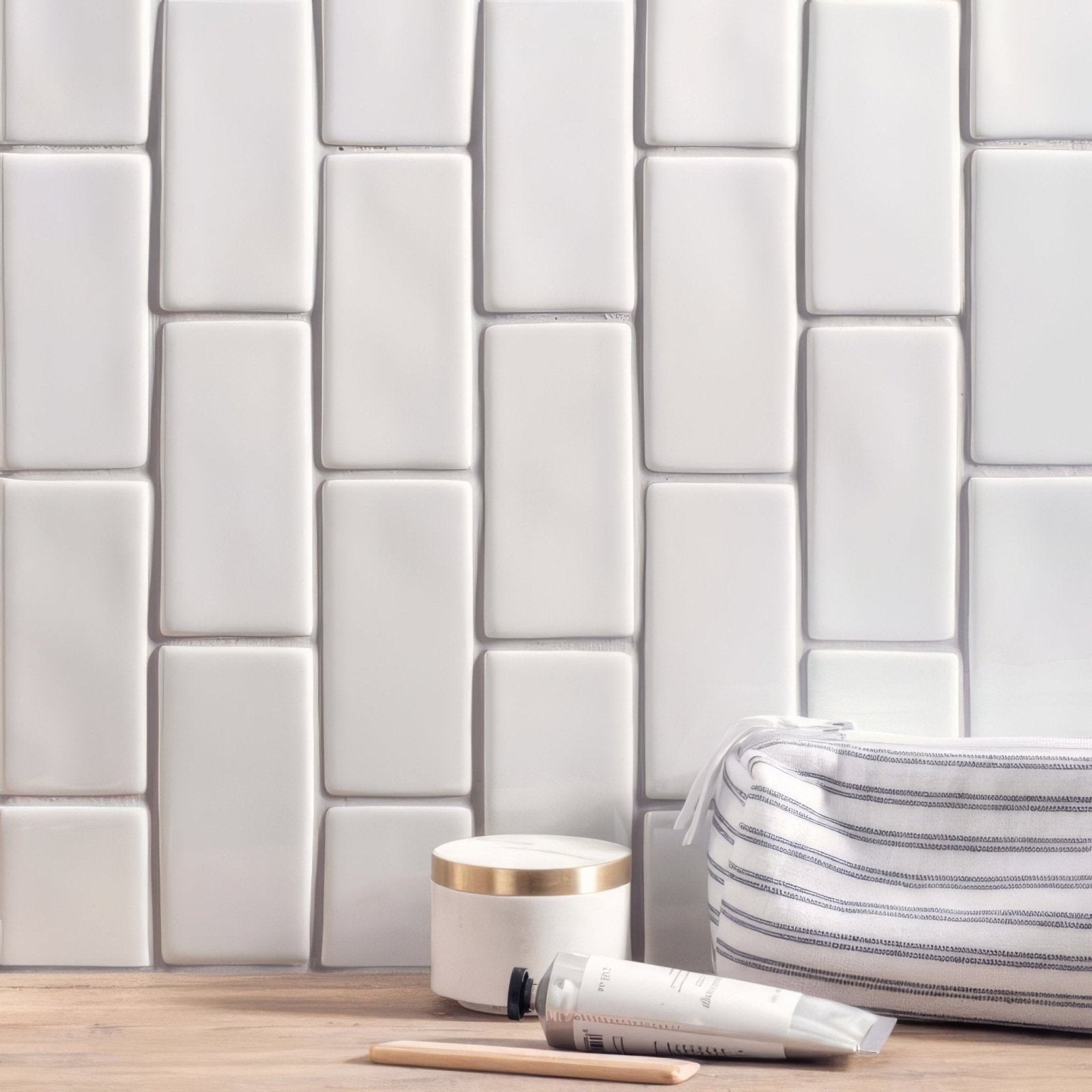 Delft white half tile featuring white rectangular subway tiles with a subtle glossy finish in a brick pattern