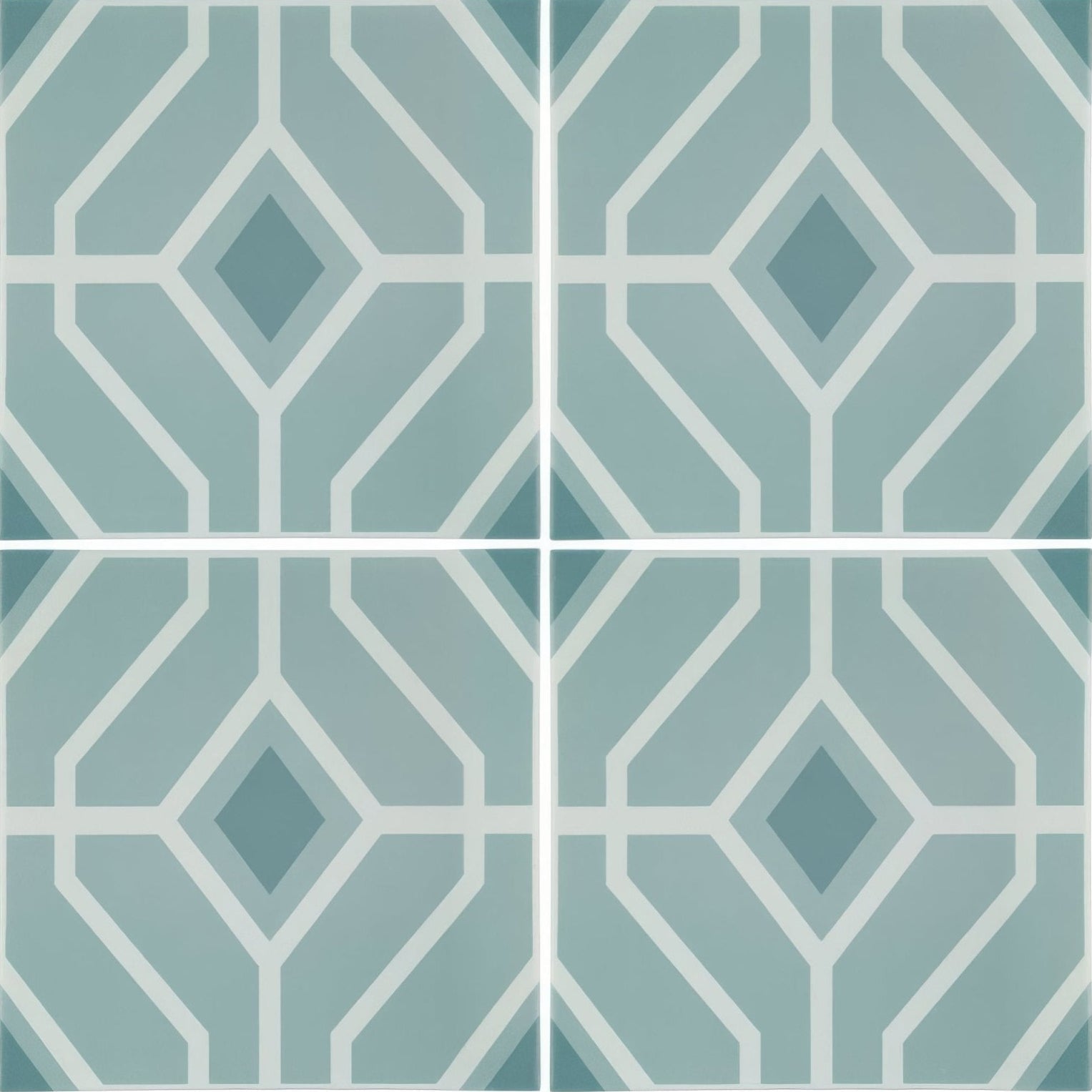 Teal and white geometric patterned ceramic floor tiles from designers guild laterza slate blue collection