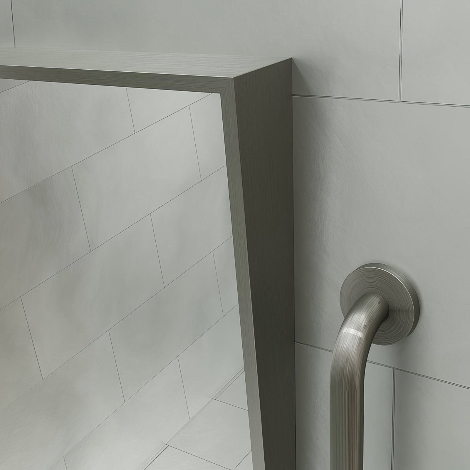 Stainless steel grab bar with brushed finish mounted on tiled wall for Docklands Inclusive angled mirror installation