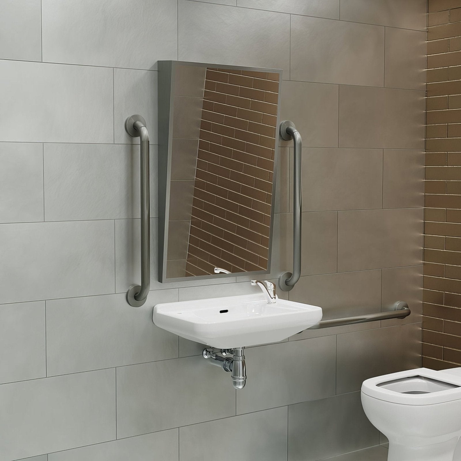 Silver-framed rectangular Docklands Inclusive angled mirror in brushed stainless steel mounted above a white sink