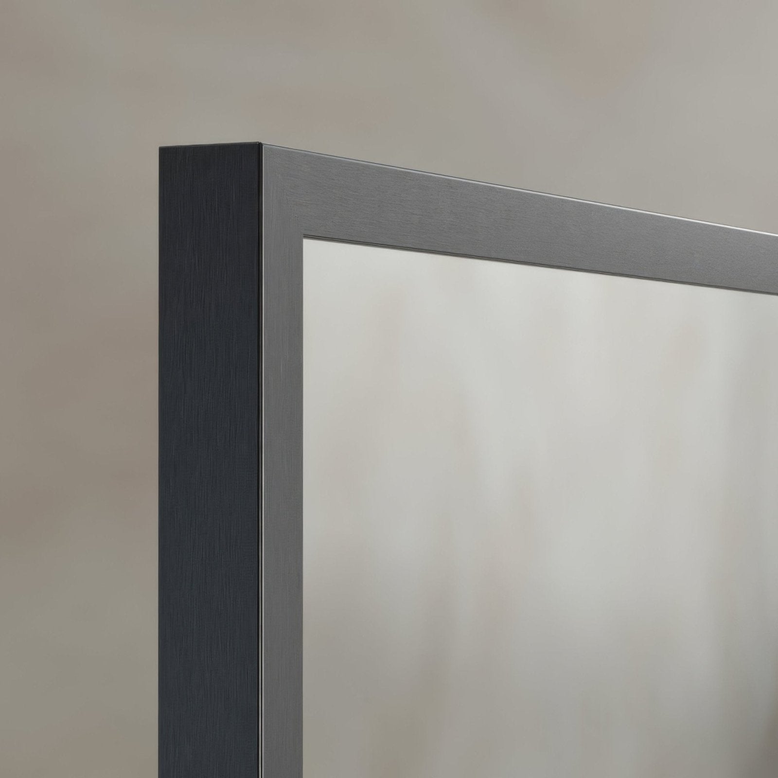 Docklands rectangular mirror 50x80cm with a matte black frame and silver brushed stainless steel trim