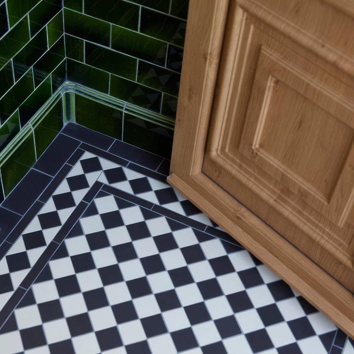 Dorchester black and dover white black and white checkered floor tiles with dark blue border and green subway wall tiles