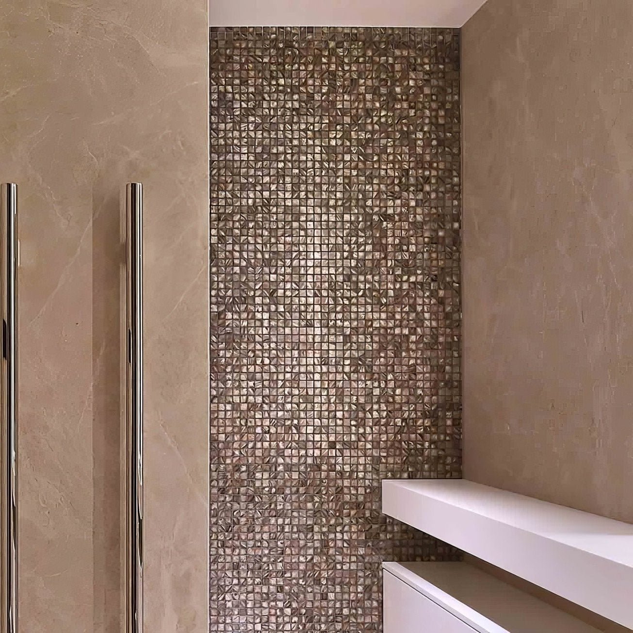 A shimmering dove grey 25mm square mosaic tile wall with small metallic bronze and silver glass pieces