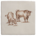 Cream-colored ceramic tile with a detailed sepia illustration of two brown cattle on cotton fabric background
