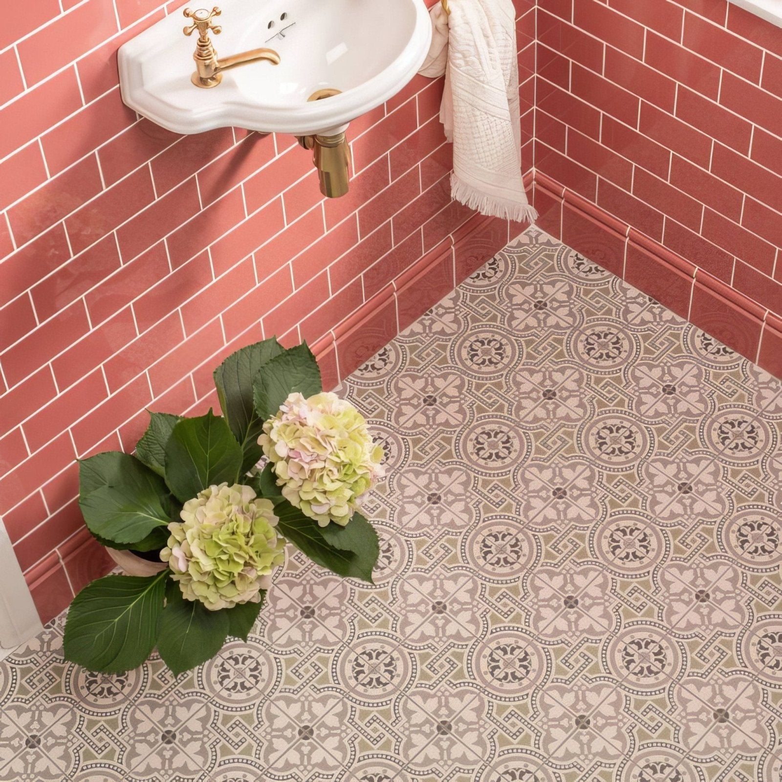 Patterned duchy pink half tile with beige and gray floral designs for decorative flooring use