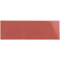 A glossy terracotta rectangular duchy pink large brick tile with a smooth uniform surface for wall or floor use