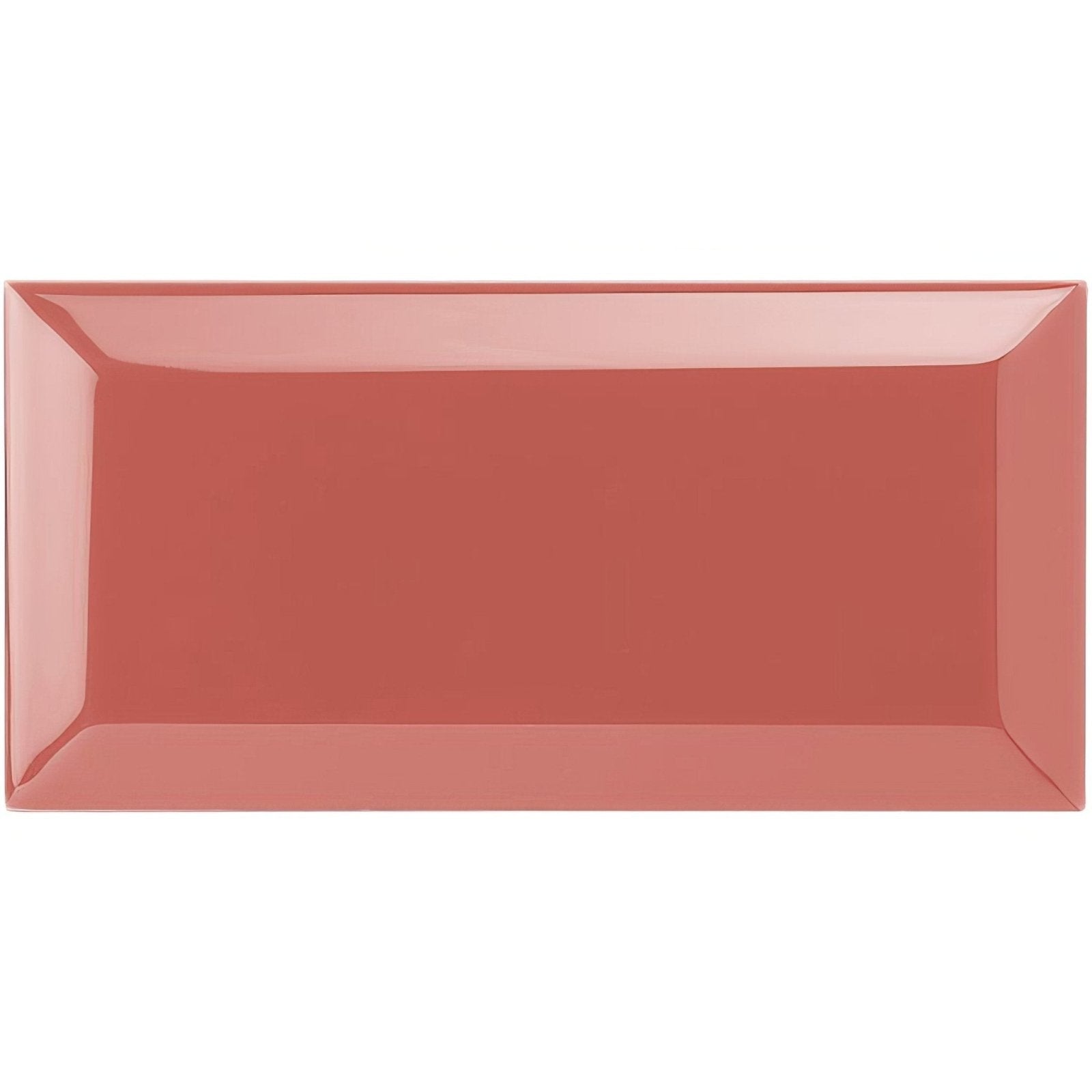 A sleek rectangular ceramic serving platter in glossy terracotta with subtly beveled edges from duchy pink metro bevelled tile