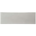 A sleek rectangular ceramic crackle glazed brick tile dunwich in soft gray with a smooth glossy finish
