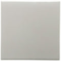 A sleek square ceramic dunwich field tile with a smooth matte off-white finish and subtle glossy edges