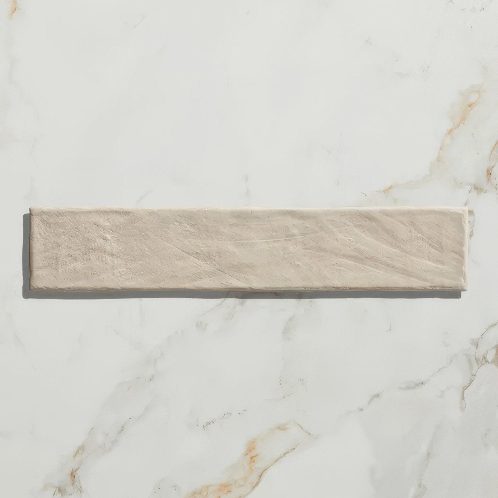 Beige earthenware porcelain linen tile with textured stone-like surface and subtle natural veining