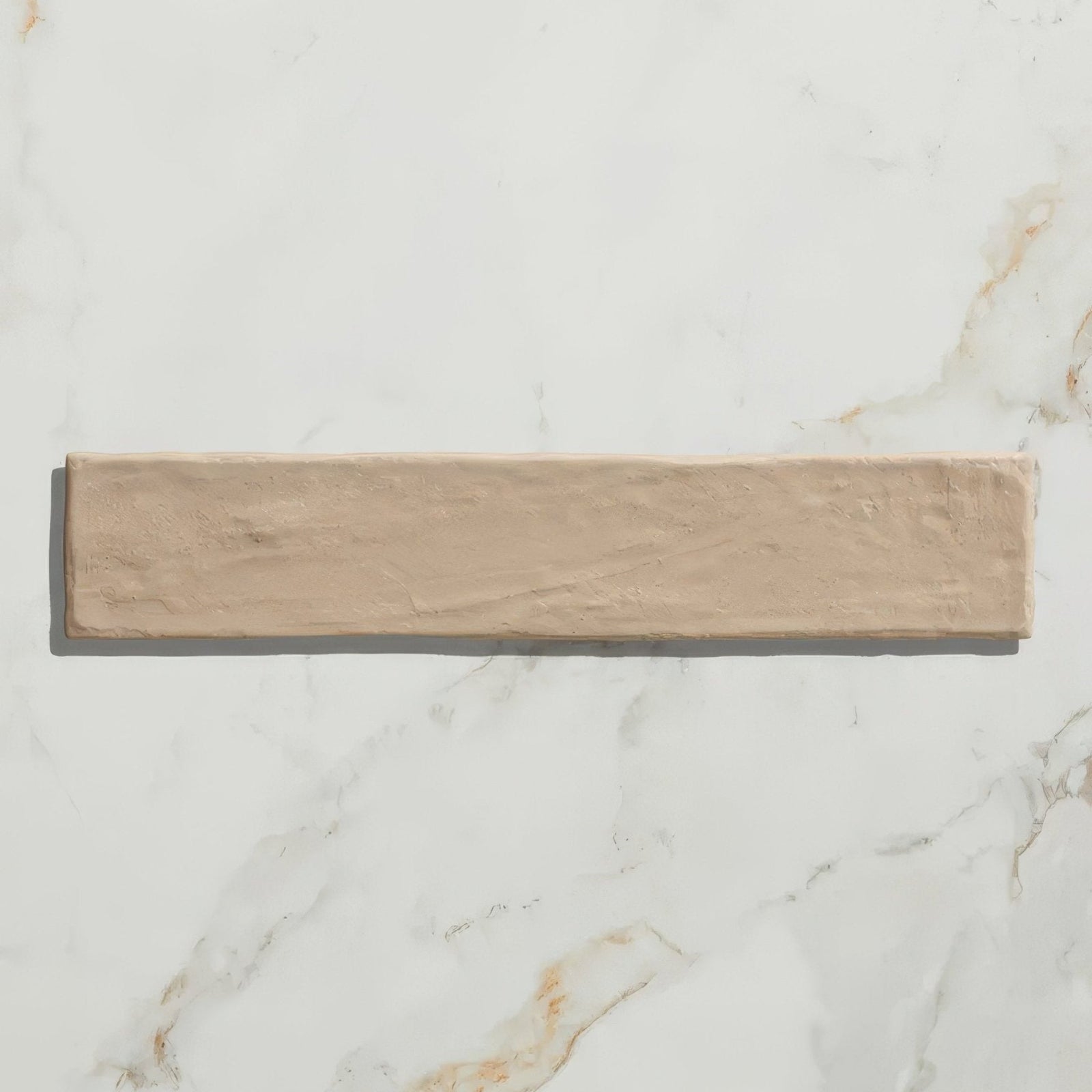 Beige rectangular earthenware porcelain plaster tile with a textured rustic finish for wall and floor use