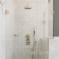 East Hampton Basketweave Marble Mosaic white and black marble basketweave mosaic with a chrome showerhead