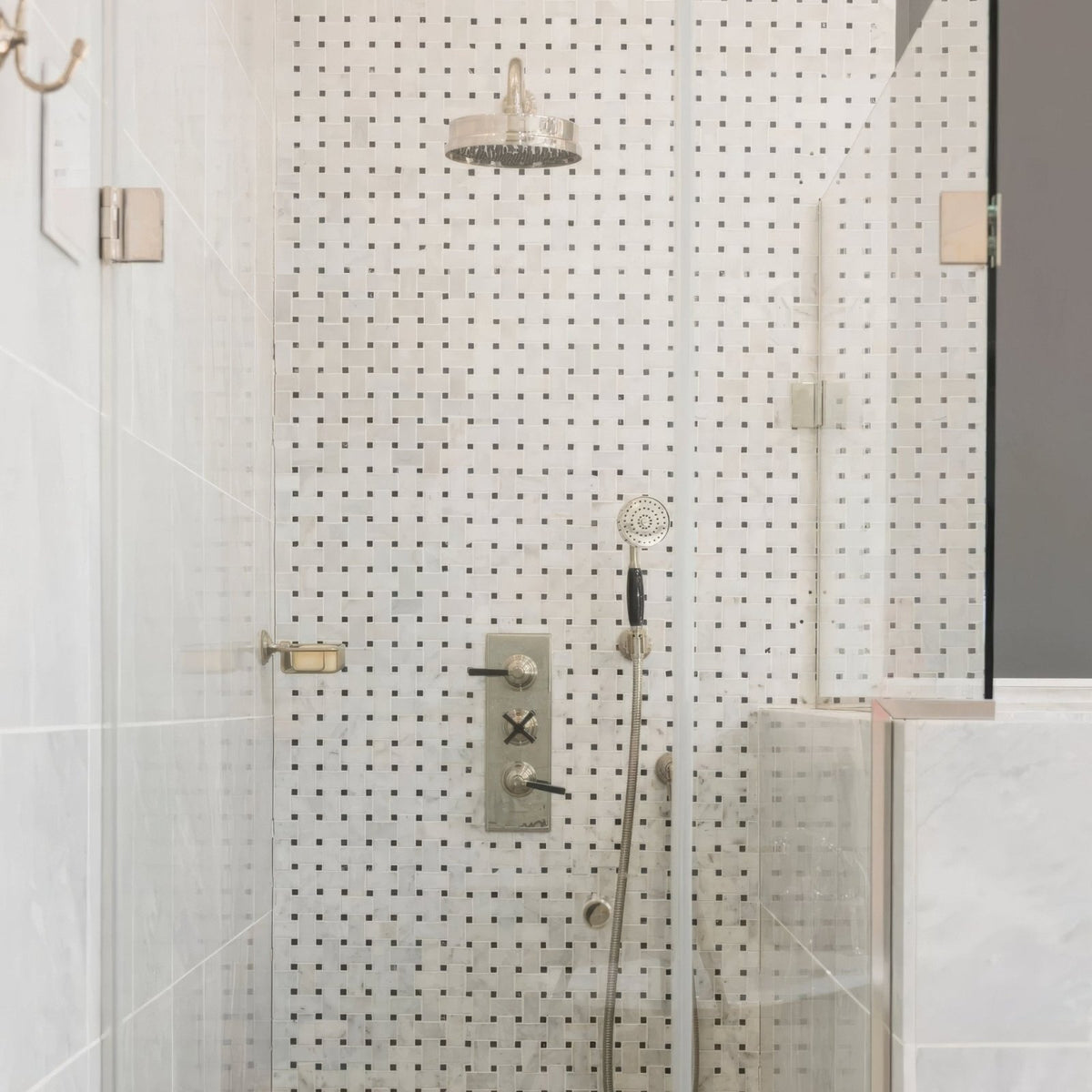 East Hampton Basketweave Marble Mosaic white and black marble basketweave mosaic with a chrome showerhead