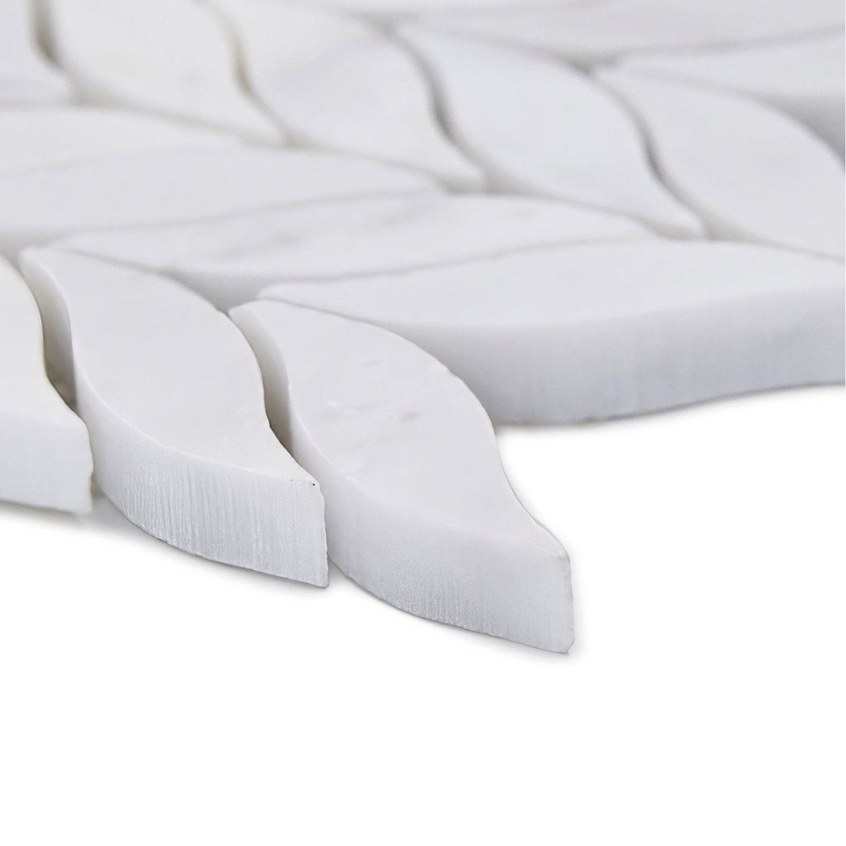 White marble leaf-shaped mosaic tiles in a woven pattern for east hampton willow leaf marble mosaic product