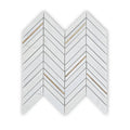 East Hampton marble chevron mosaic tile in white marble with a chevron pattern and thin gold metallic strips