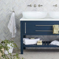 East Hampton Marble Chevron Mosaic white marble and gold chevron mosaic on a navy vanity with white vessel sinks