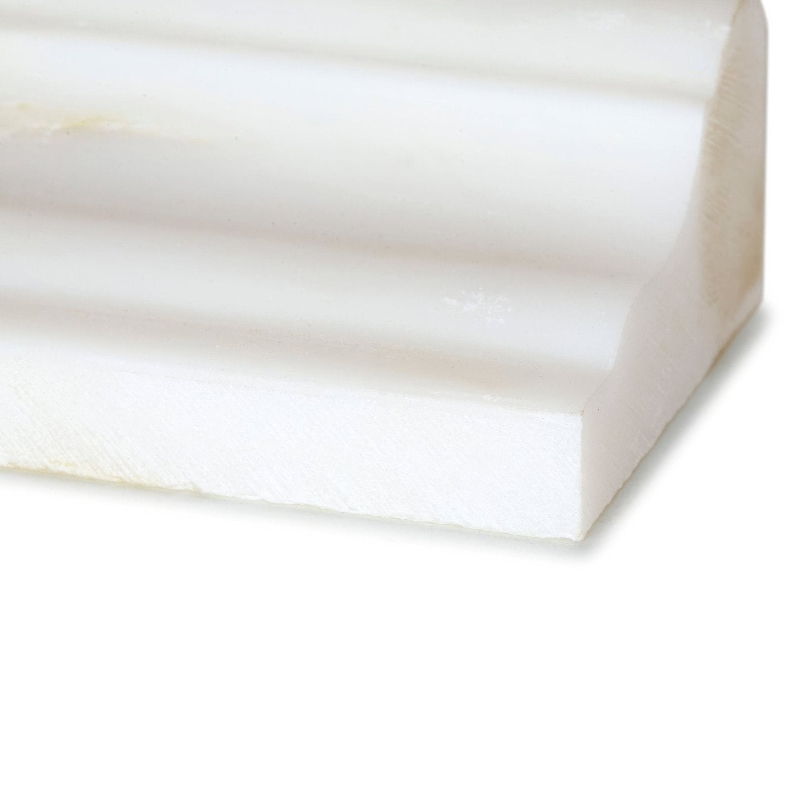 White smooth curved marble architectural molding with a subtle sheen from east hampton marble dado collection