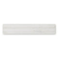 White marble subway tile with subtle veining and sleek modern design from East Hampton Marble Deco Dado collection