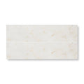 Two rectangular white marble tiles with subtle beige veining east hampton marble tile 5x20cm