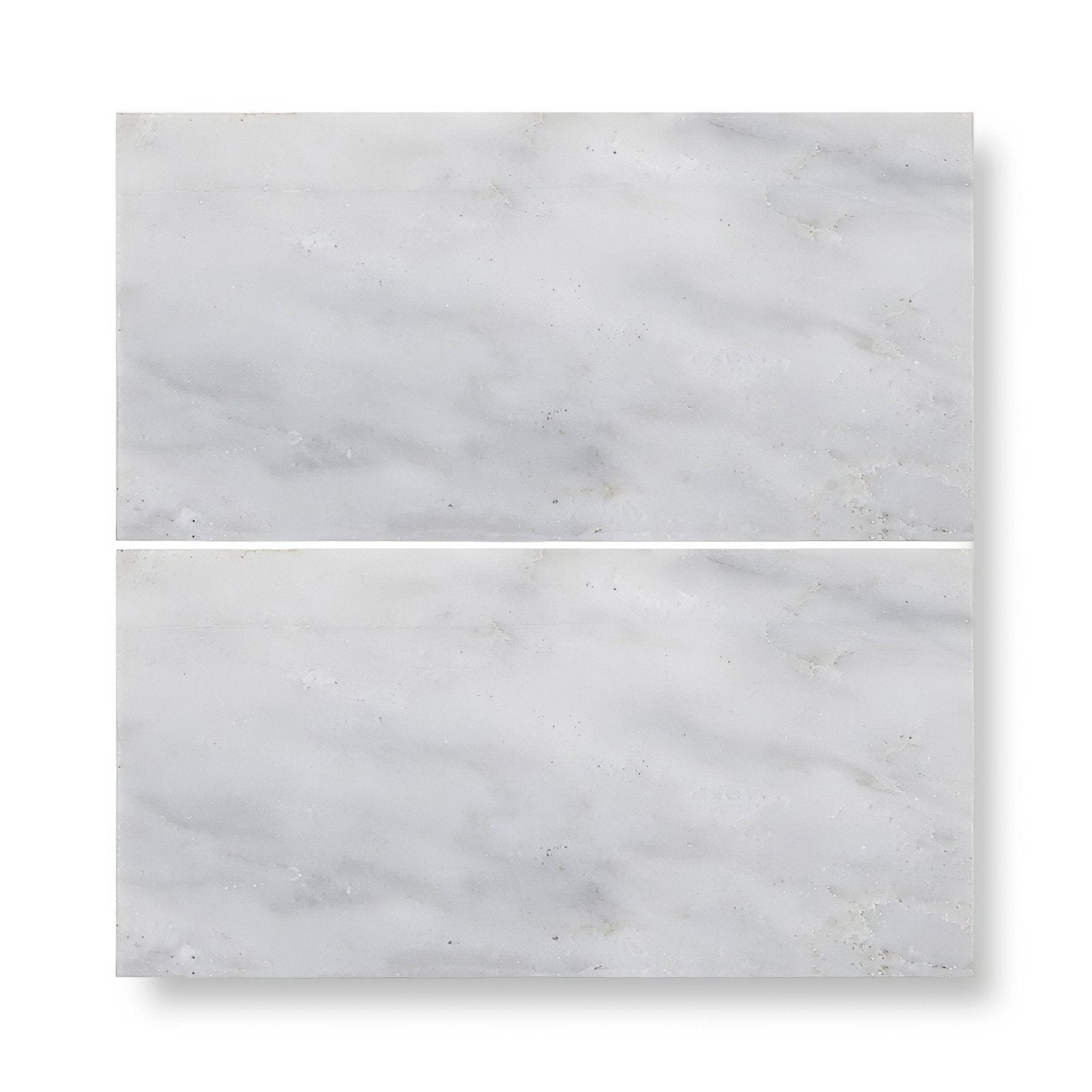 Two rectangular east hampton marble tiles 7.5x15cm in white with subtle gray veining
