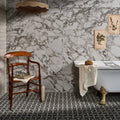 East Village Porcelain Basketweave Mosaic Bianco black and white marble porcelain basketweave mosaic with a white clawfoot bathtub