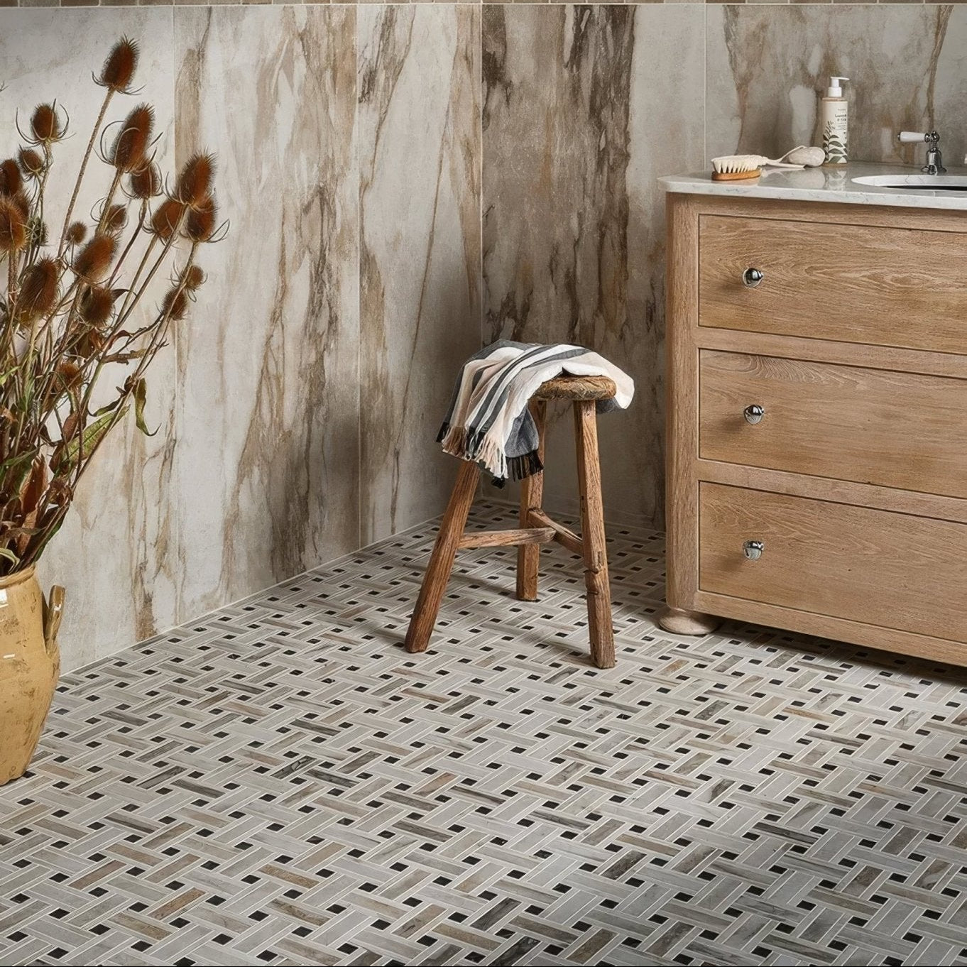 Gray and black herringbone pattern porcelain mosaic tile floor from east village basketweave collection oro