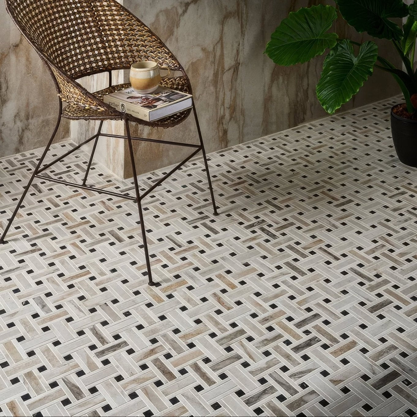 Woven wicker chair with a dark metal frame featuring porcelain basketweave mosaic in oro color