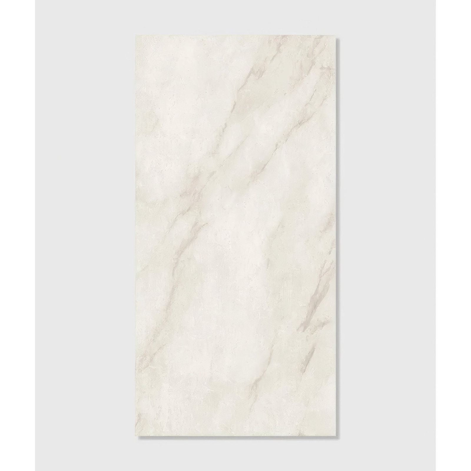 A rectangular east village porcelain bianco tile in white marble effect with subtle gray veining 60 x 120cm