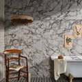 East Village Porcelain Grigio 60 x 60cm grey marble-effect porcelain tile with a vintage wooden chair
