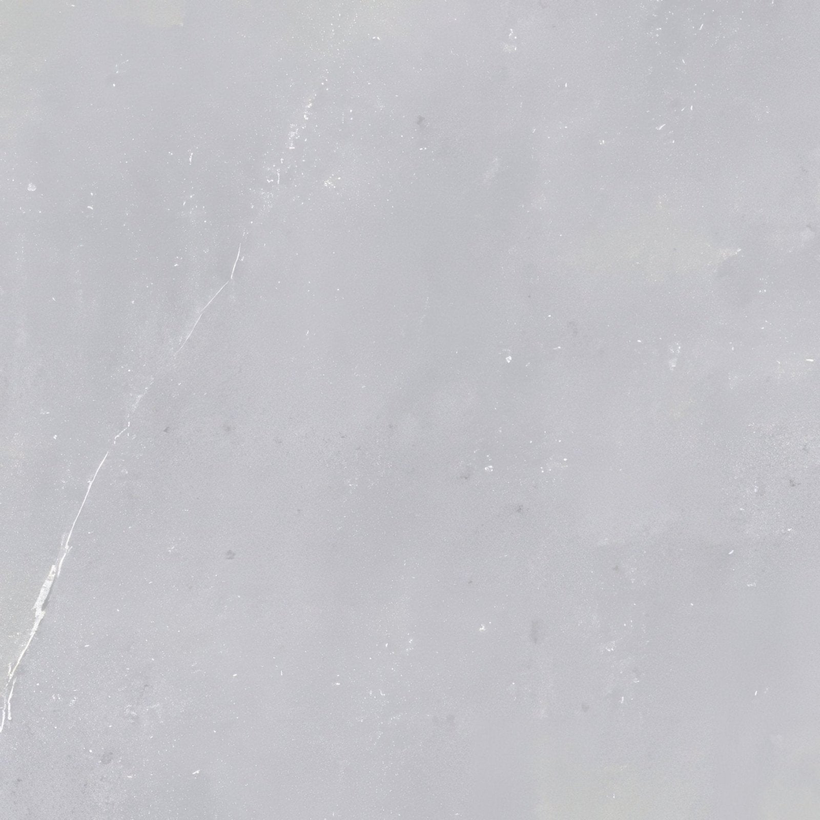 Eastford grey matt porcelain tile with a smooth light gray marble surface featuring subtle veining and minor imperfections