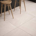 Beige marble-effect eastford mink matt porcelain floor tiles with subtle white veining and matt finish
