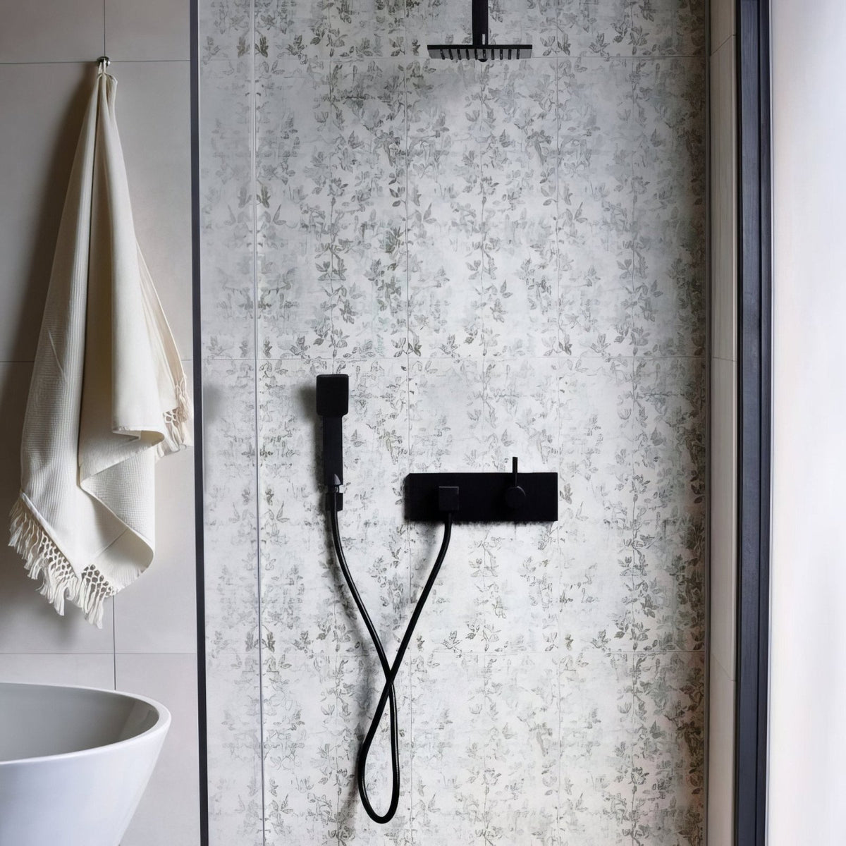 Eden pergola 60x30cm black matte-finish showerhead and faucet assembly with sleek modern design on patterned tiles