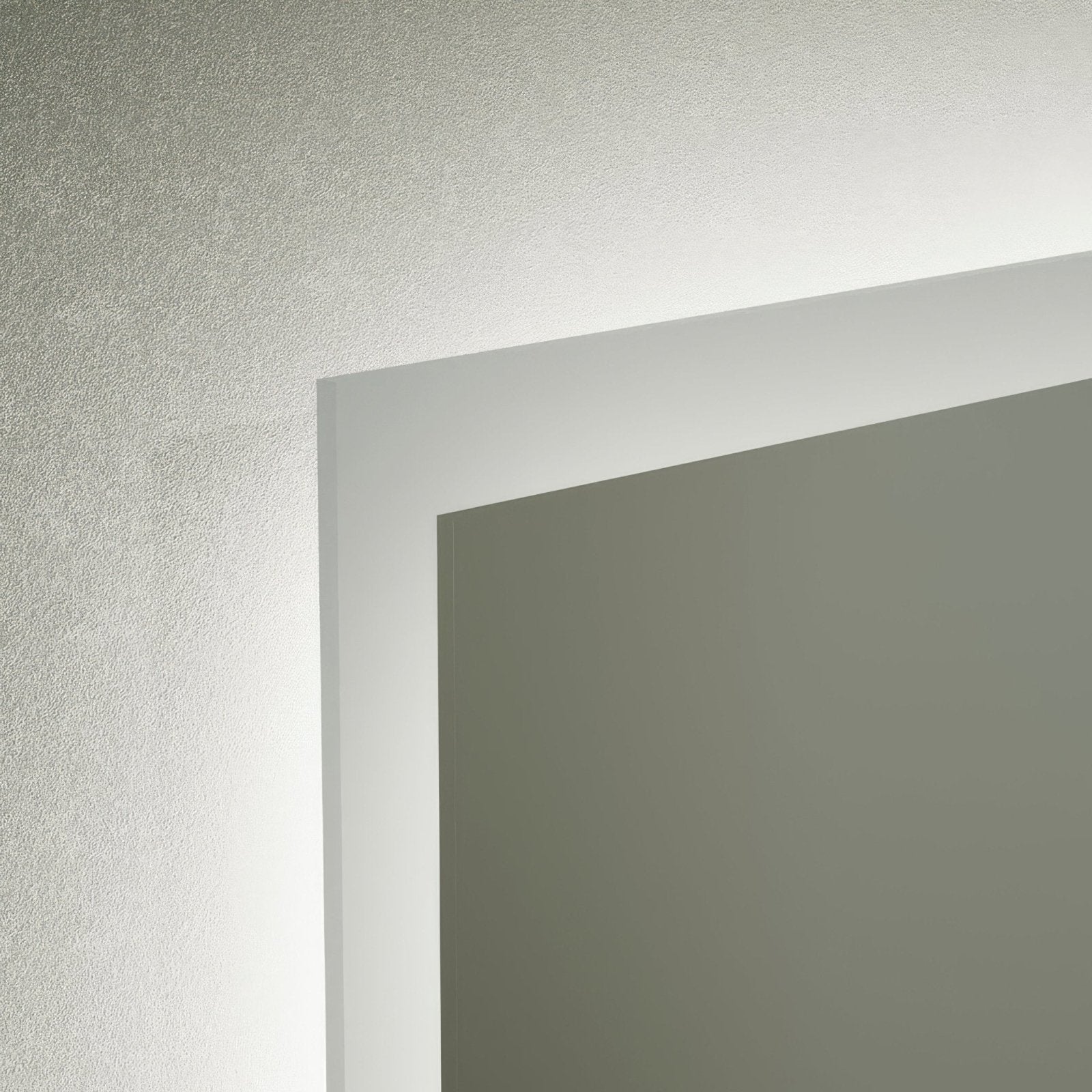 White painted smooth rectangular door frame edge against textured wall for edison rectangular mirror 60