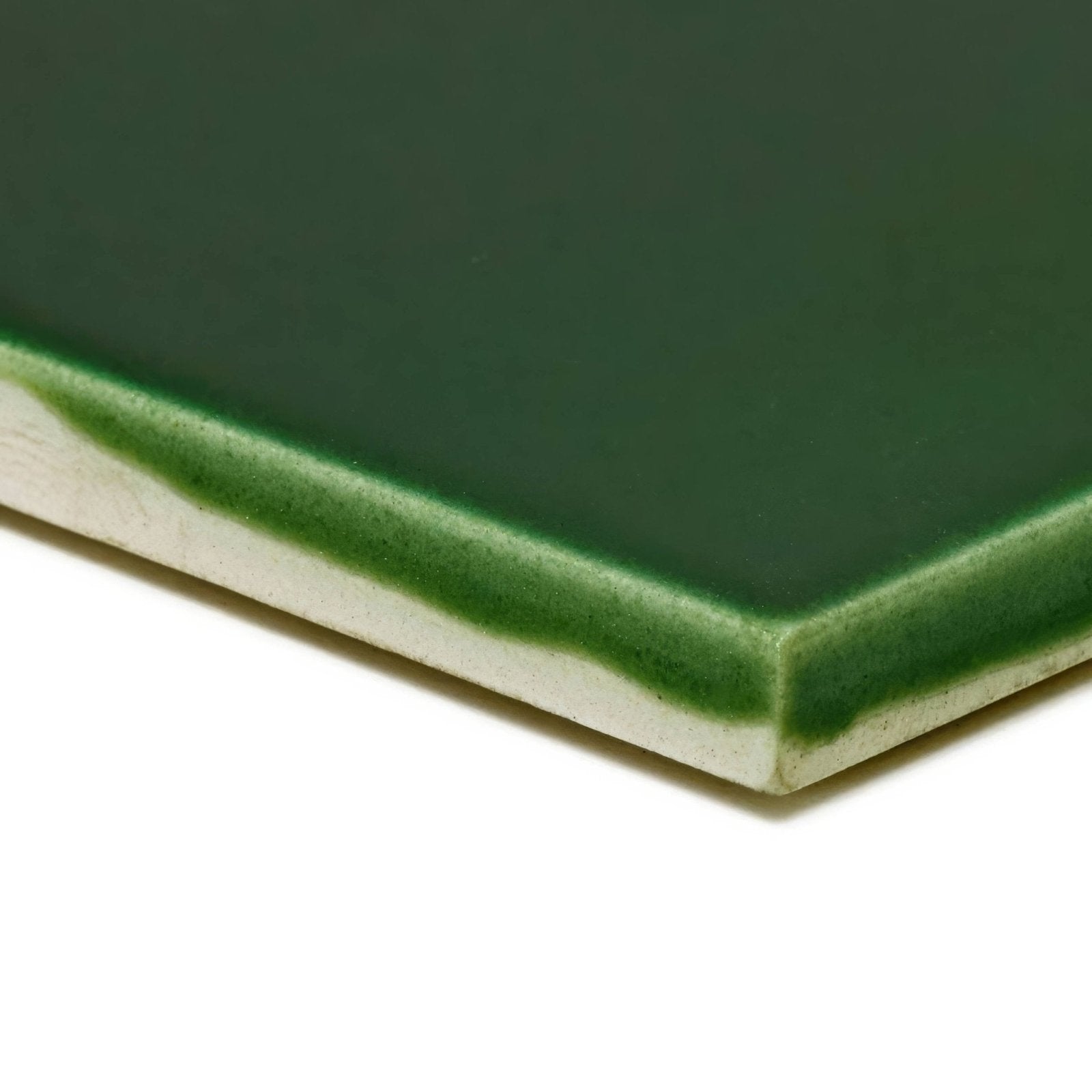 Edwardian Caledonian base dark green ceramic tile with glossy finish and subtle lighter green gradient along edge