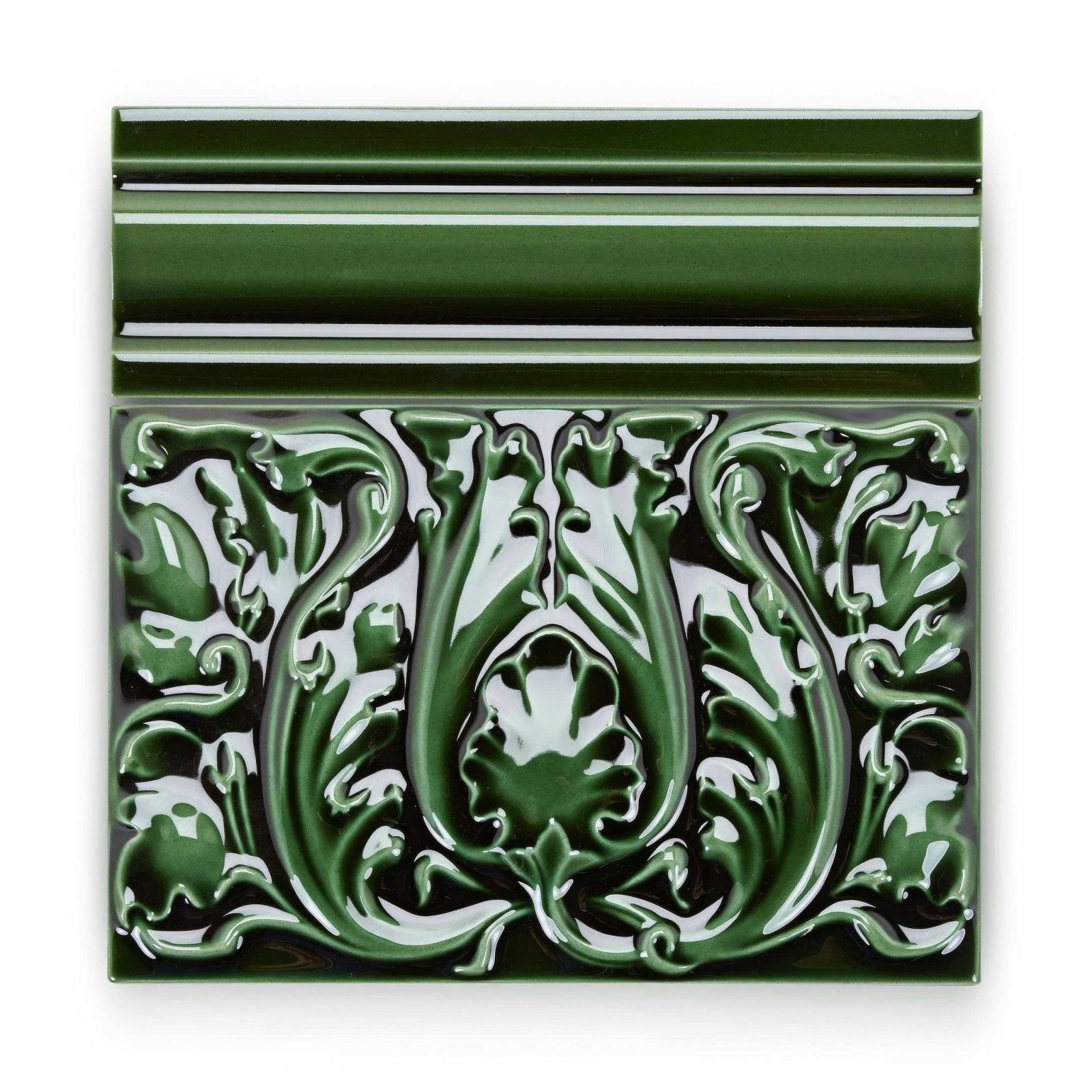 A glossy forest green ceramic Edwardian Caledonian dado tile with intricate raised floral patterns and a decorative border