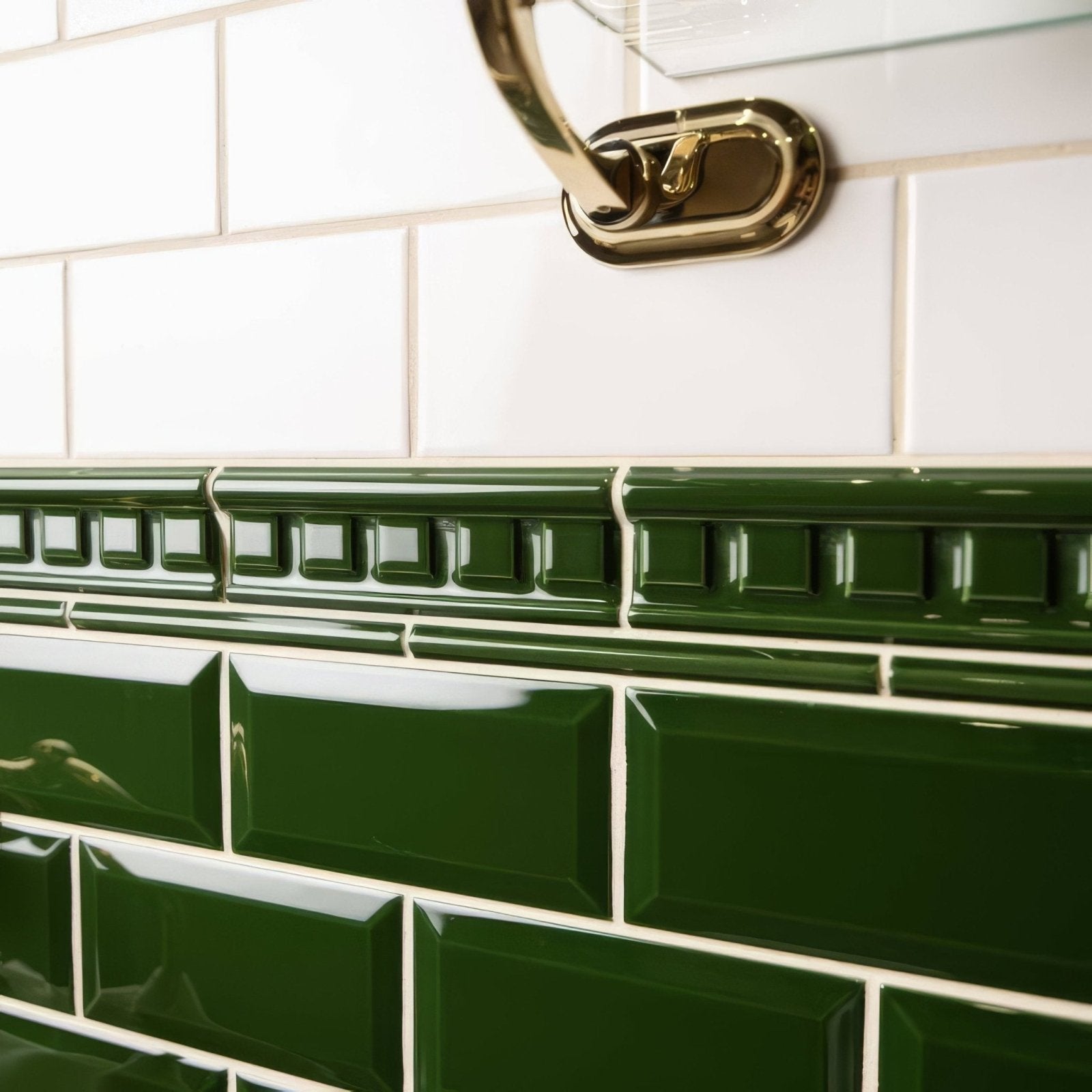 Deep green glossy ceramic subway tiles with raised rectangular pattern from edwardian green dentil moulding collection