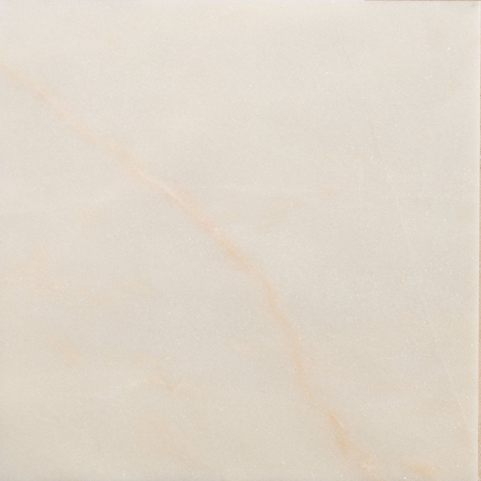 Cream-colored elixir marble cashmere honed tile with subtle veining and a smooth honed finish