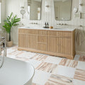 Elixir Marble Honed marble-effect tile in a bathroom