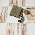 Elixir Marble Honed marble-effect tiles in a bathroom