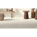 Cream-colored matte-finish ceramic floor tiles elsian mediterranea brushed 80 x 80 cm with subtle grout lines