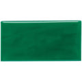 A glossy emerald green rectangular ceramic tile with a smooth reflective surface called emerald green half tile